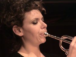 stephanie richards performing on the trumpet at event in jamaica neighborhood of Queens NYC