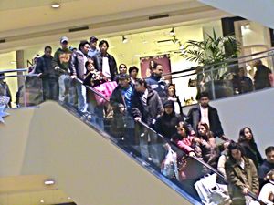 shoppers at Queens Center Mall in Elmhurst neighborhood Queens NY