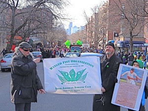 winged fist in st patricks day parade in queens